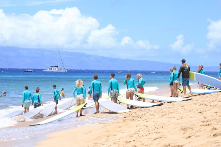 Maui: Group Surf Lesson - Gear Included: Rashguard, Reef Booties, Board, Leash