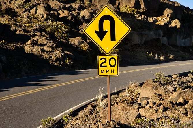 Maui Haleakala Self Paced Downhill Bike Tour with Mountain Riders - Switchbacks, big views, and the cool-air clothing check