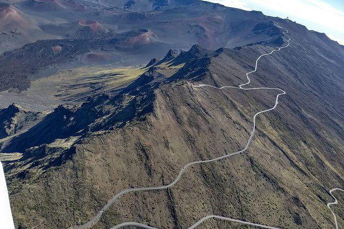 Maui-PRIVATE-Air Tour: Volcano Lava & Jungle Waterfalls (2-5 Max) - Ghost sugar factory: seeing industry history from the sky